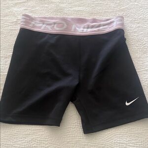 Never worn Nike pros! Baby pink waistband